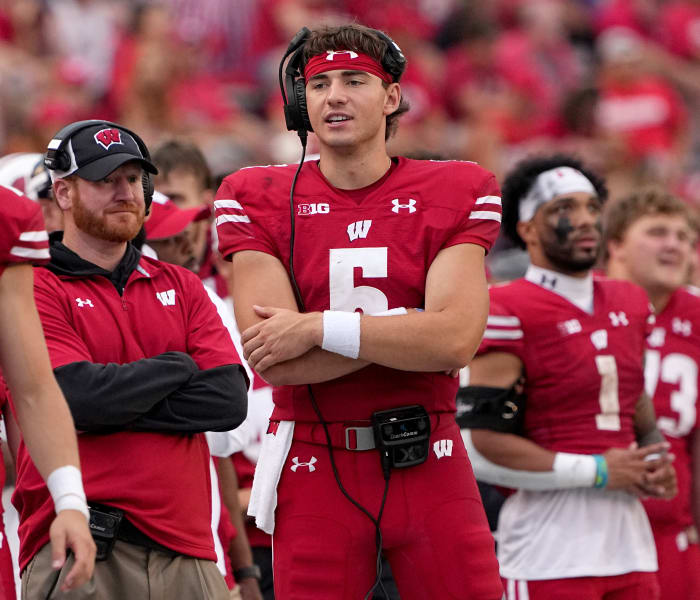 Wisconsin quarterback Graham Mertz standing on the sidelines during the fourth quarter against New Mexico State.